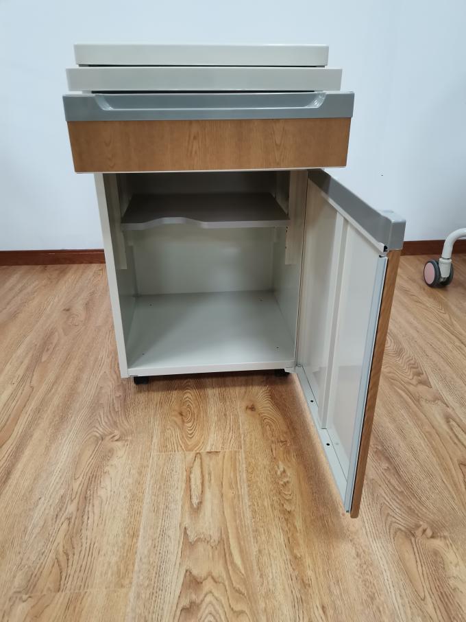 एल्यूमीनियम प्लेट संरचना अस्पताल बेडसाइड कैबिनेट टेबल लकड़ी का रंग कैस्टर के साथ 1